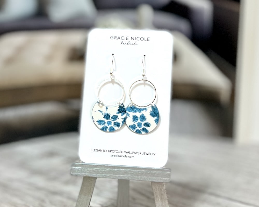 blue floral print earrings handmade by gracie nicole. elegantly upcycled wallpaper earrings.