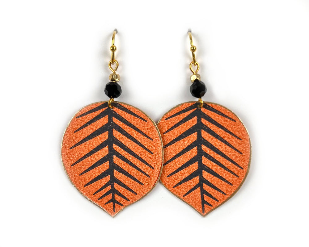 Playful Orange and Black Leaf Earrings with Bead Accents